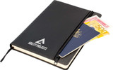 A black A5 notebook with dark grey trim, featuring a zip pocket holding a passport and currency.