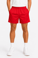 Red rugby men's shorts featuring an elastic waistband and a logo. Suitable for sports and casual wear.