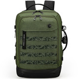 A green Swissdigital Berg L Backpack features multiple zip pockets, a textured front, and adjustable straps.