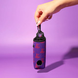 A neoprene golf ball sleeve in purple with a pattern, featuring a strap for easy carrying.