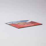 A 50mm x 50mm fridge magnet with a colourful design and a logo on it, featuring a flat edge.