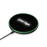 A black wireless charger with a green accent and a logo displayed on top.