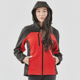 A hooded softshell jacket in black and red, featuring a zip front and pockets. The model wears the jacket with a neutral background.