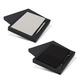 A gift set featuring a black notebook and pen, presented in a sleek black box with a minimalist design.