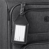 A black luggage tag attached to a grey suitcase, featuring a clear window for personal information.