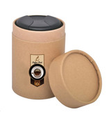 A cylindrical kraft paper tube with a black lid, featuring a logo on the front, open to reveal the interior.