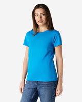 A blue Gildan Heavy Cotton Ladies' T-Shirt displayed on a model, featuring a simple design without visible logos.