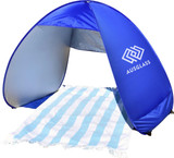 A blue pop-up beach shelter with a striped towel inside, featuring a logo on the exterior.