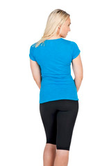 A blue women's T-shirt with a fitted design, viewed from the back, paired with black leggings.