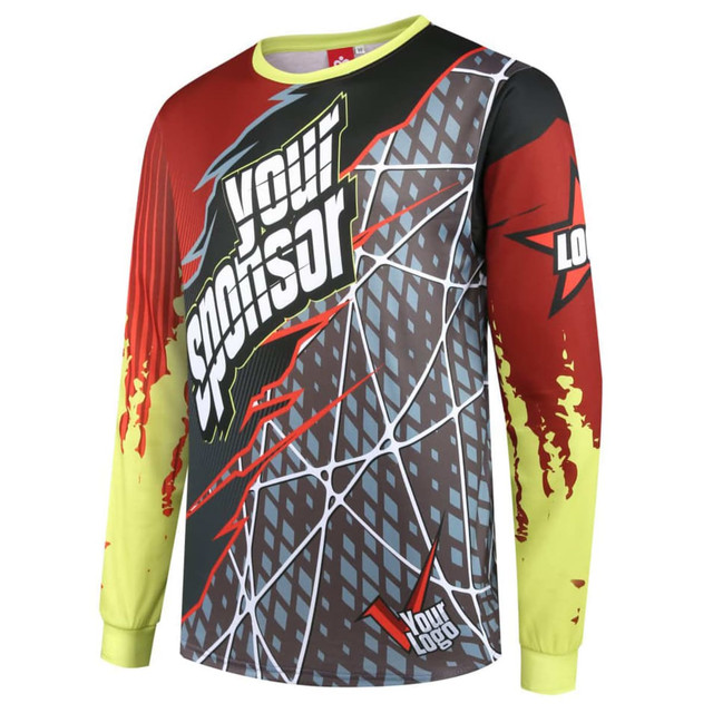 A long-sleeve shirt featuring a vibrant design in red, yellow, and grey with a logo on the front.