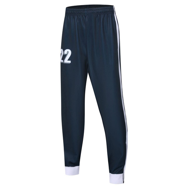 Navy cricket uniform pants with white side stripes and a number on one leg. Includes a logo on the waistband.