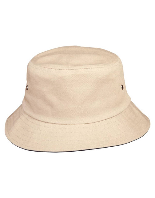 A beige bucket hat with a wide brim and ventilation holes, featuring a logo on the side.