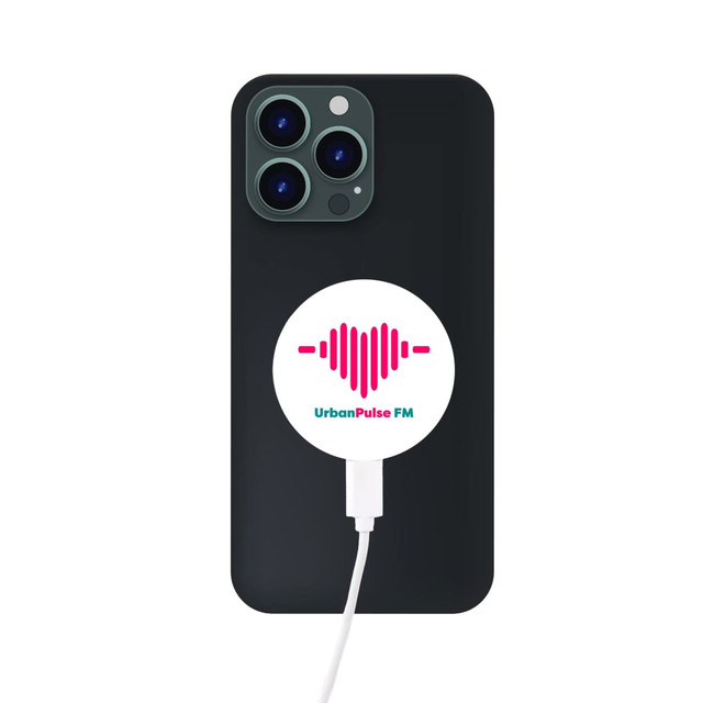 A black smartphone with a circular white magnetic wireless charger attached, featuring a logo design.