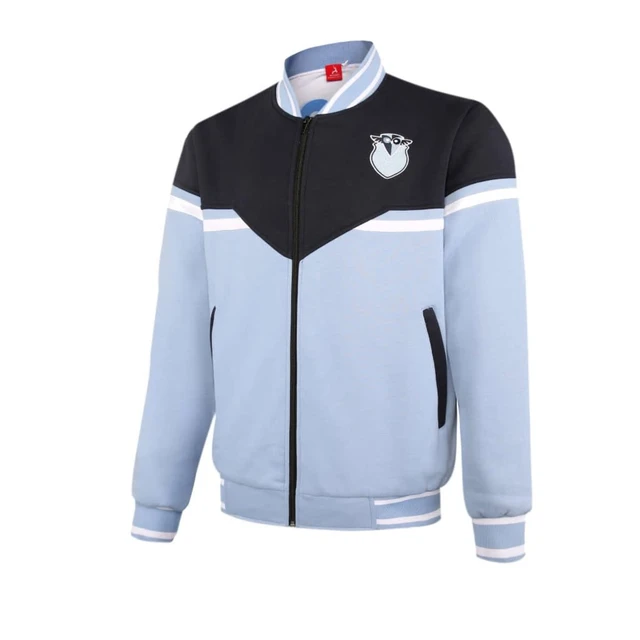 A bomber jacket in light blue and black, featuring a logo and contrasting stripes on the chest and sleeves.