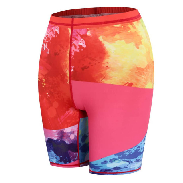 A pair of multicoloured women's shorts featuring a vibrant abstract design, with shades of red, pink, and blue.