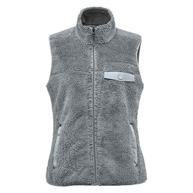 A grey women's sherpa fleece vest with a high collar, zipped front, and two side pockets. It features a small pocket on the chest.