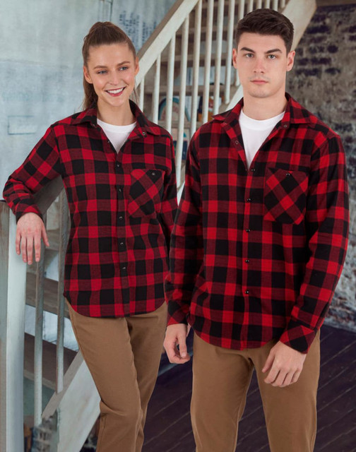 A unisex flannel plaid shirt in red and black, displayed on a male and female model, featuring a logo.