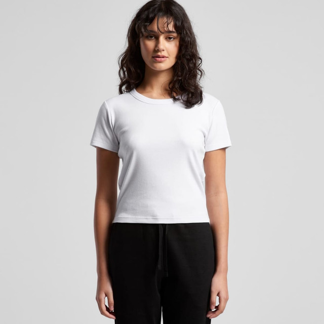 A white, short-sleeved baby tee with a fitted design. The model stands against a plain background.