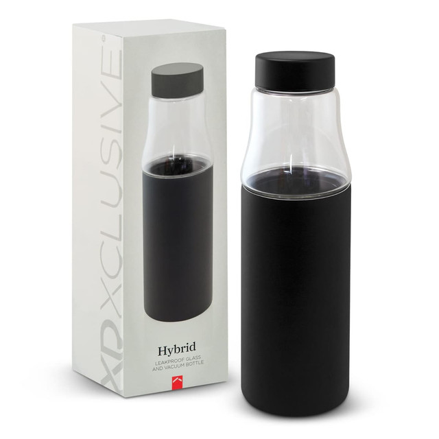 A drink bottle with a transparent glass top and a matte black base, presented in a box featuring branding.