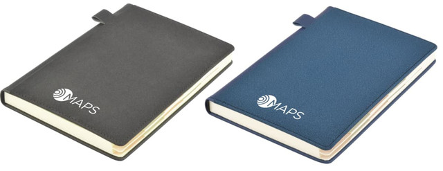 Two Tab Deluxe A5 Notebooks in grey and navy, featuring a logo on the cover. Both have a sleek design with a closure.