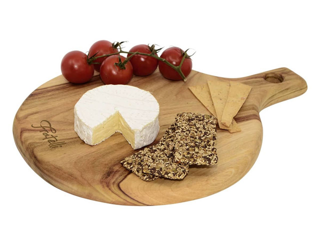 A round wooden serving board featuring a brie cheese, crackers, and cherry tomatoes. Includes a branding logo.