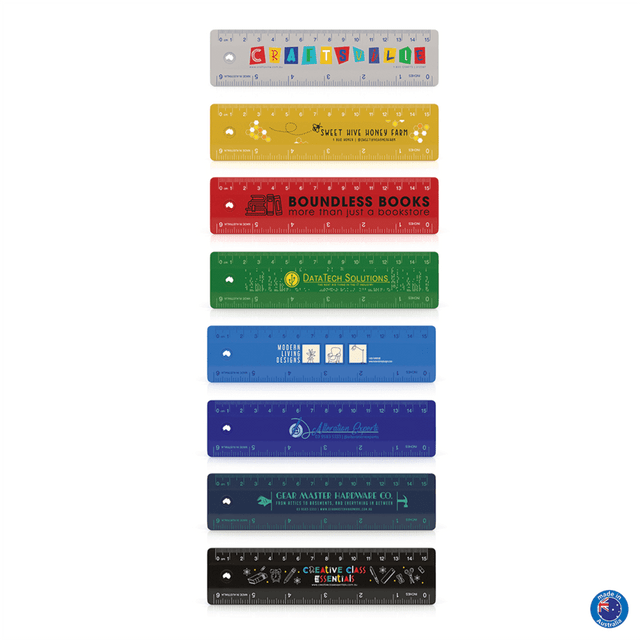 A set of colourful 15cm rulers in various shades, each featuring different branding and designs.