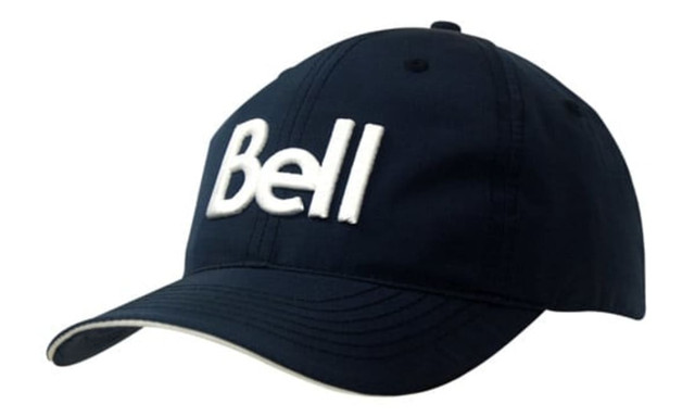A navy cap featuring a white embroidered logo. The design includes a curved brim and a flexible strap at the back.
