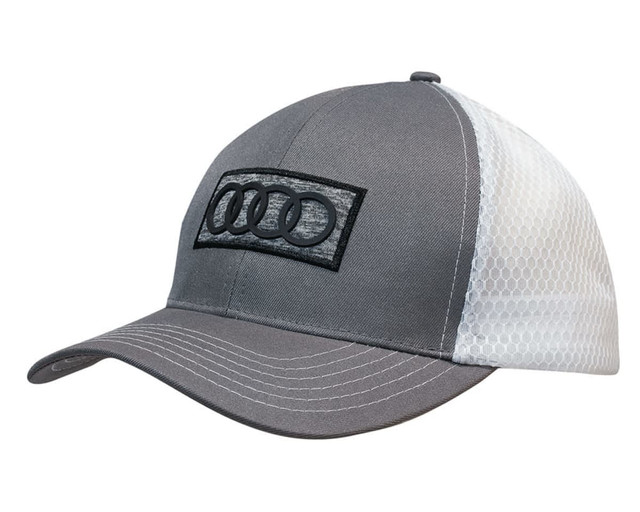 A grey cap with a honeycomb mesh design and a logo on the front. The cap has a curved visor.