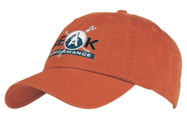 An orange cap with a curved brim and a logo on the front. It features ventilation holes on top.