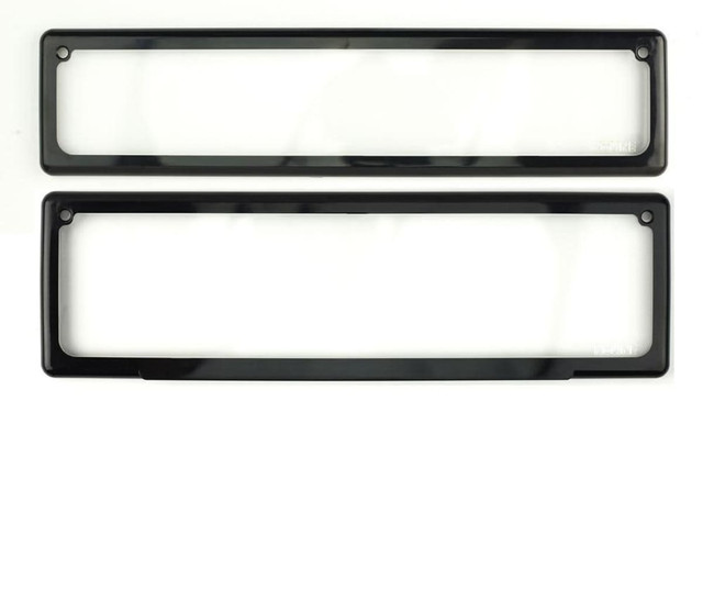 A pair of black license plate frames with a sleek, rectangular design and rounded edges.