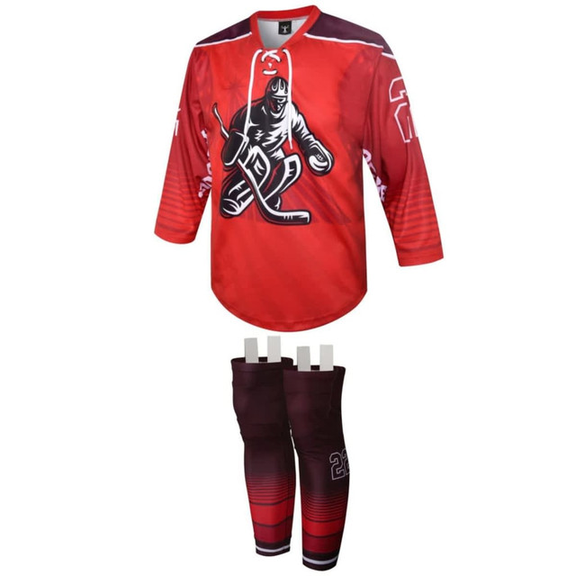 A red hockey jersey featuring a graphic of a player and matching red gradated pants. The outfit includes a logo.