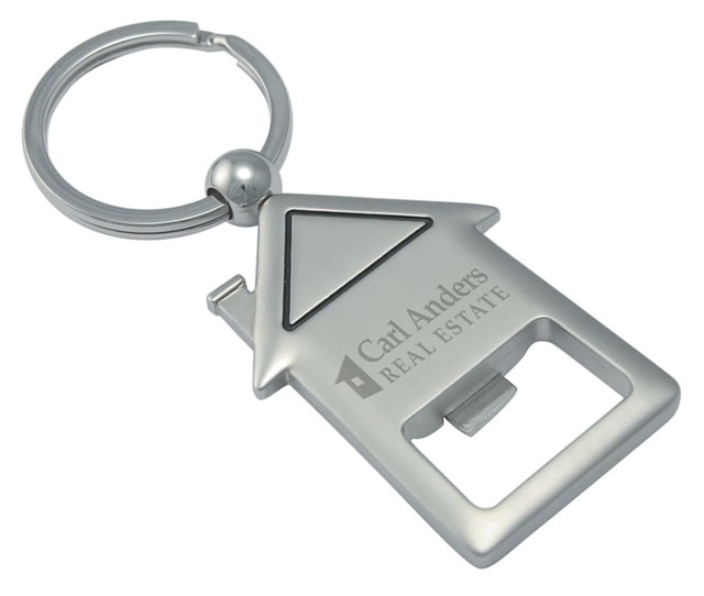 A drink bottle opener keyring shaped like a house, featuring a silver metallic finish and a logo.