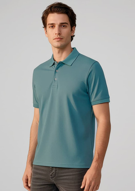 A men's short sleeve polo in teal, featuring a collar and buttons, modelled by a man. It has a logo.