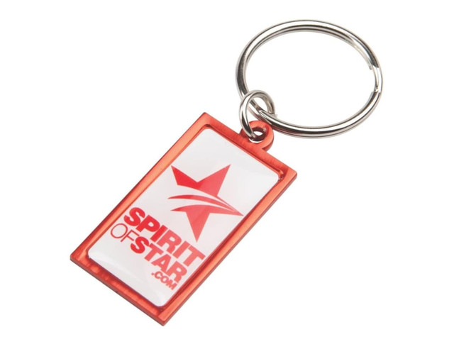 A rectangular red and white keyring with a silver keyring attachment and a logo.