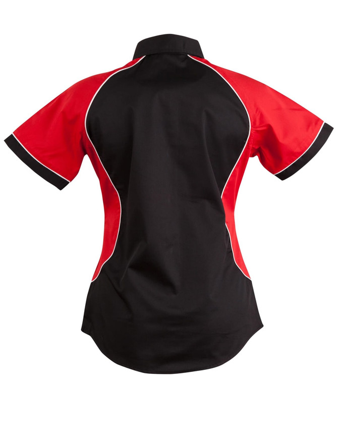 A women's button-up shirt featuring a black body and red contrast panels, with white piping details.