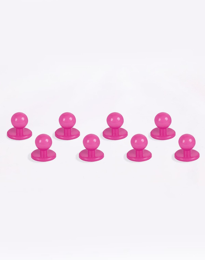 A set of eight pink exchangeable buttons for chef uniforms, featuring round tops and flat bases.