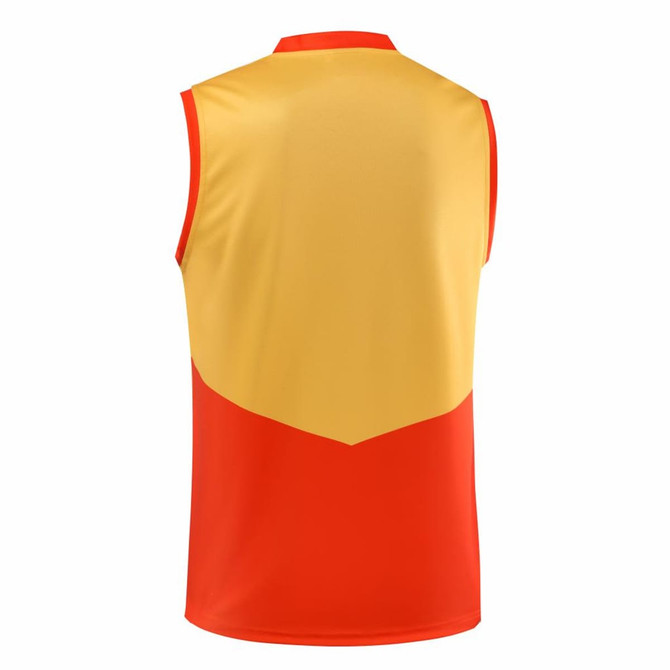 A red and yellow AFL singlet with a sleeveless design and a logo on the garment.