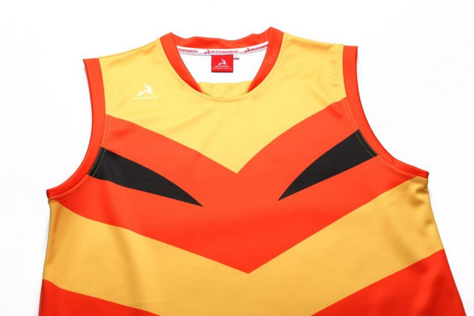 AFL singlet in vibrant orange and yellow with black accents, featuring a logo.