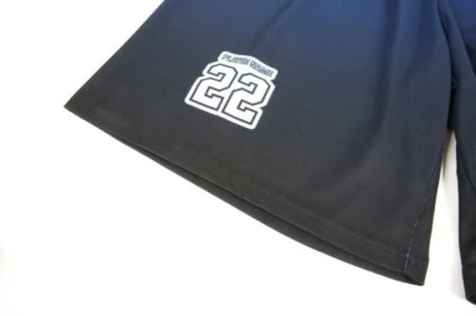 A black sports jersey featuring a number 22 and a logo on the lower left side.