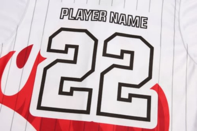 A white baseball uniform jersey featuring black stripes, with a large red flame design and the number 22.