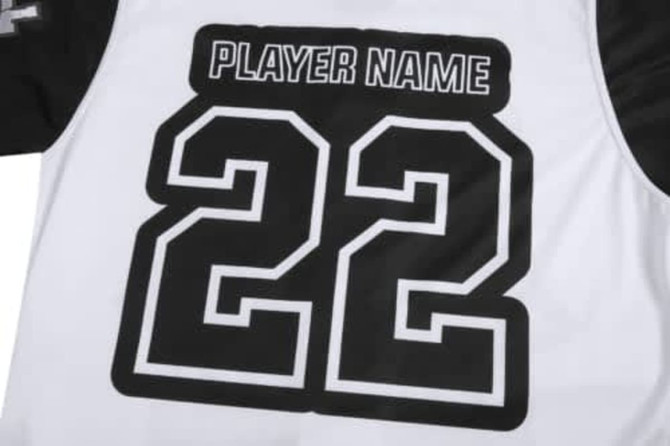A white sports jersey featuring black short sleeves and the number 22 prominently displayed.