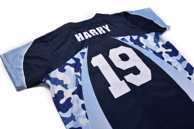 A dark blue and light blue camouflage jersey with the name "HARRY" and the number "19" on the back.