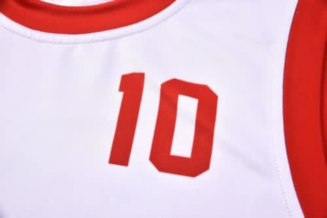 A sports jersey featuring a white base with red accents and the number "10" prominently displayed.