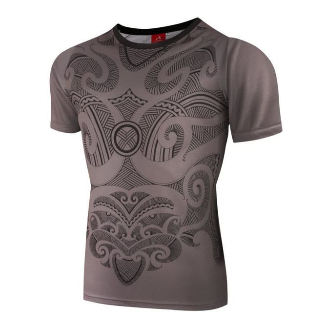 A short-sleeved jersey in grey featuring intricate black patterns and designs, along with a logo on the neckline.