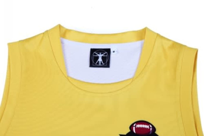 A yellow sports singlet featuring a logo and a design suitable for AFL.