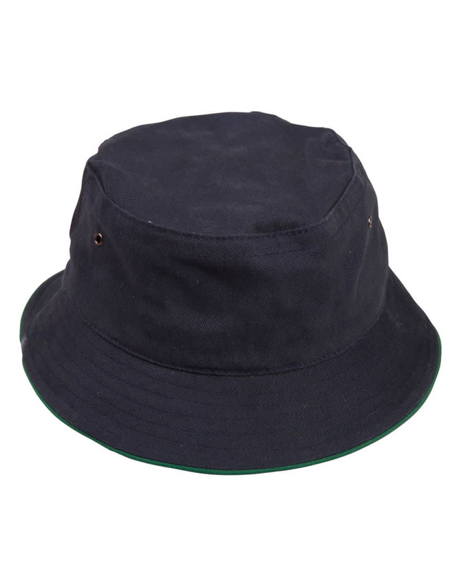 A navy bucket hat with a contrasting green brim, featuring ventilation eyelets and a logo.