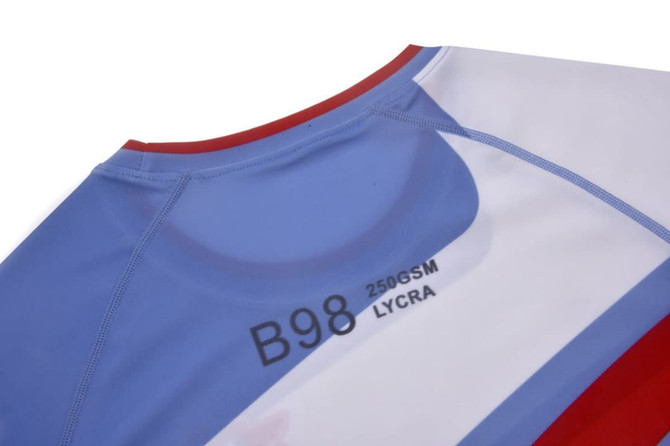 A swimwear product in blue, red, and white with a Lycra fabric. It features a logo on the back.