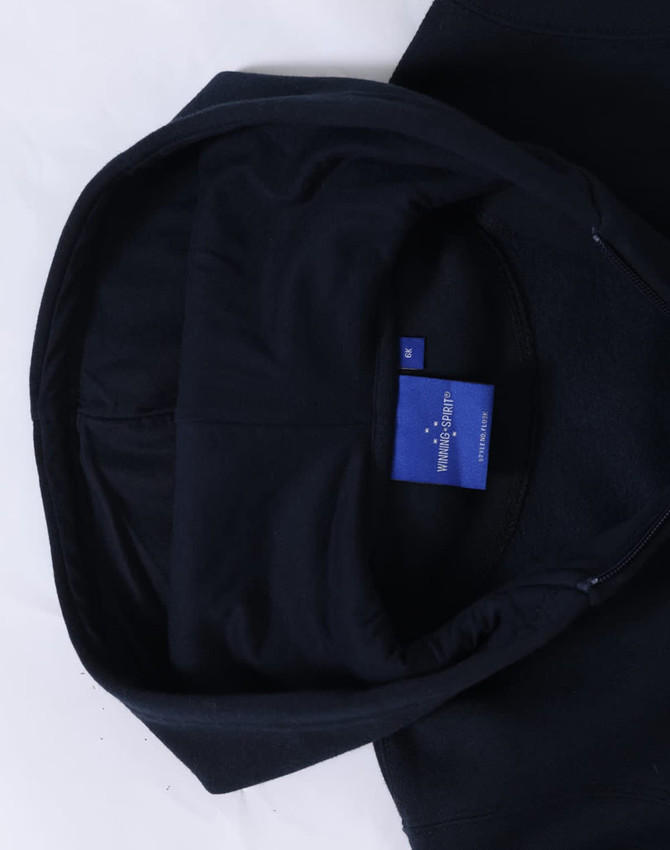 A navy full-zip fleecy hoodie featuring a hood and a branded label inside.