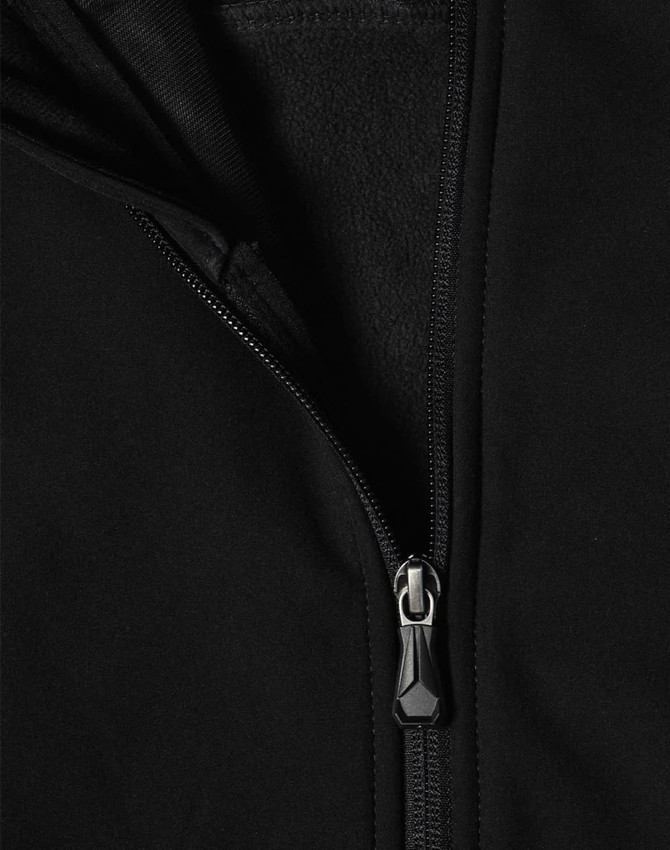 A black softshell high-tech jacket featuring a zippered front and a textured interior lining.