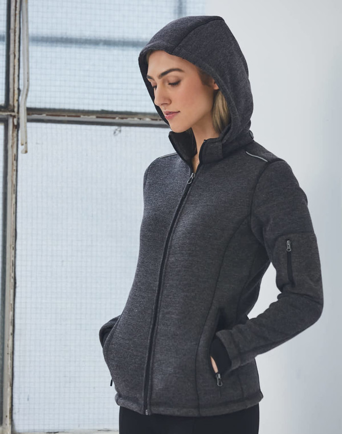 A ladies' heather bonded fleece jacket in dark grey, featuring a zip front and a hood. The jacket has a logo.